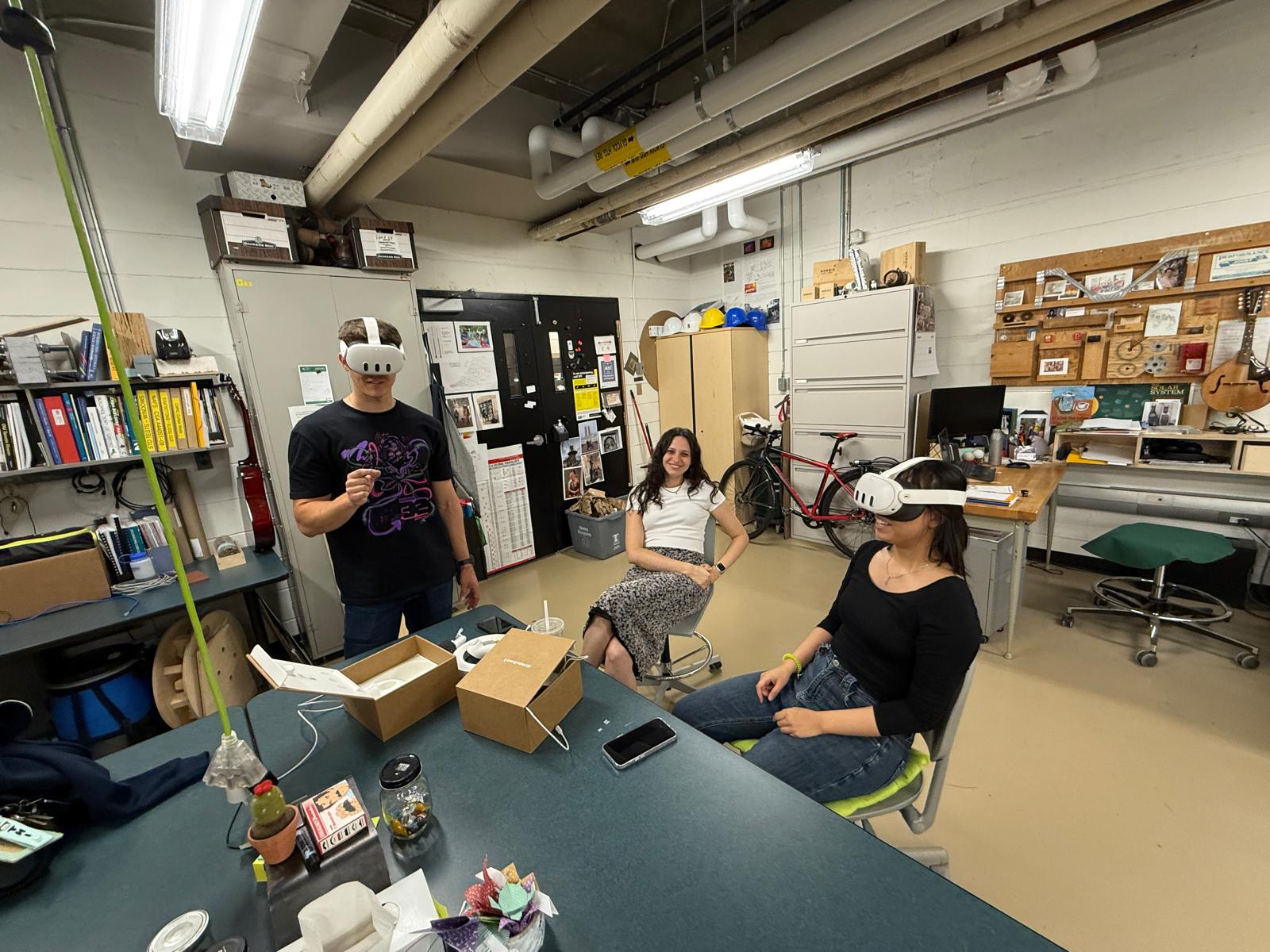 Lab members trying virtual-reality headsets together