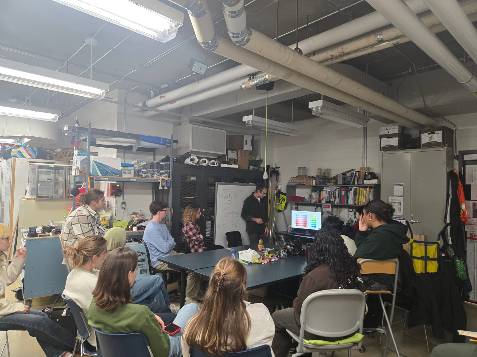 Students attending a demonstration in the building-science lab